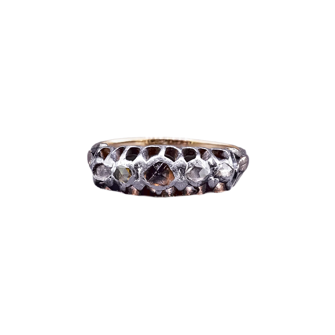 Gold ring with diamond rosettes, late 19th and early 20th century.