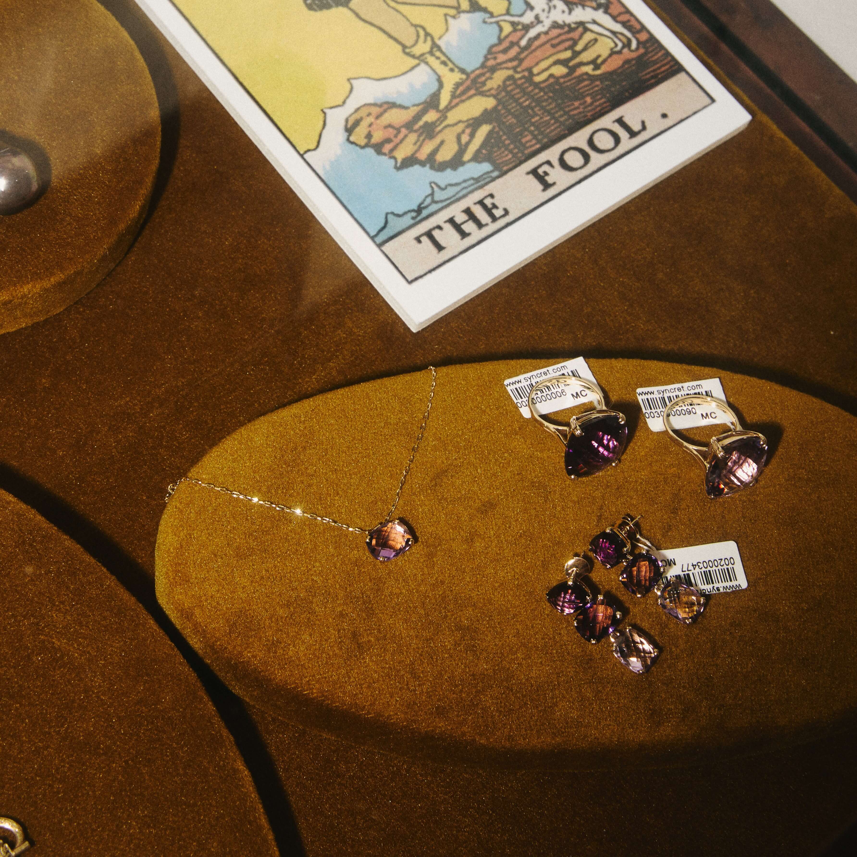 Dolce Vita gold earrings with amethysts in three shades