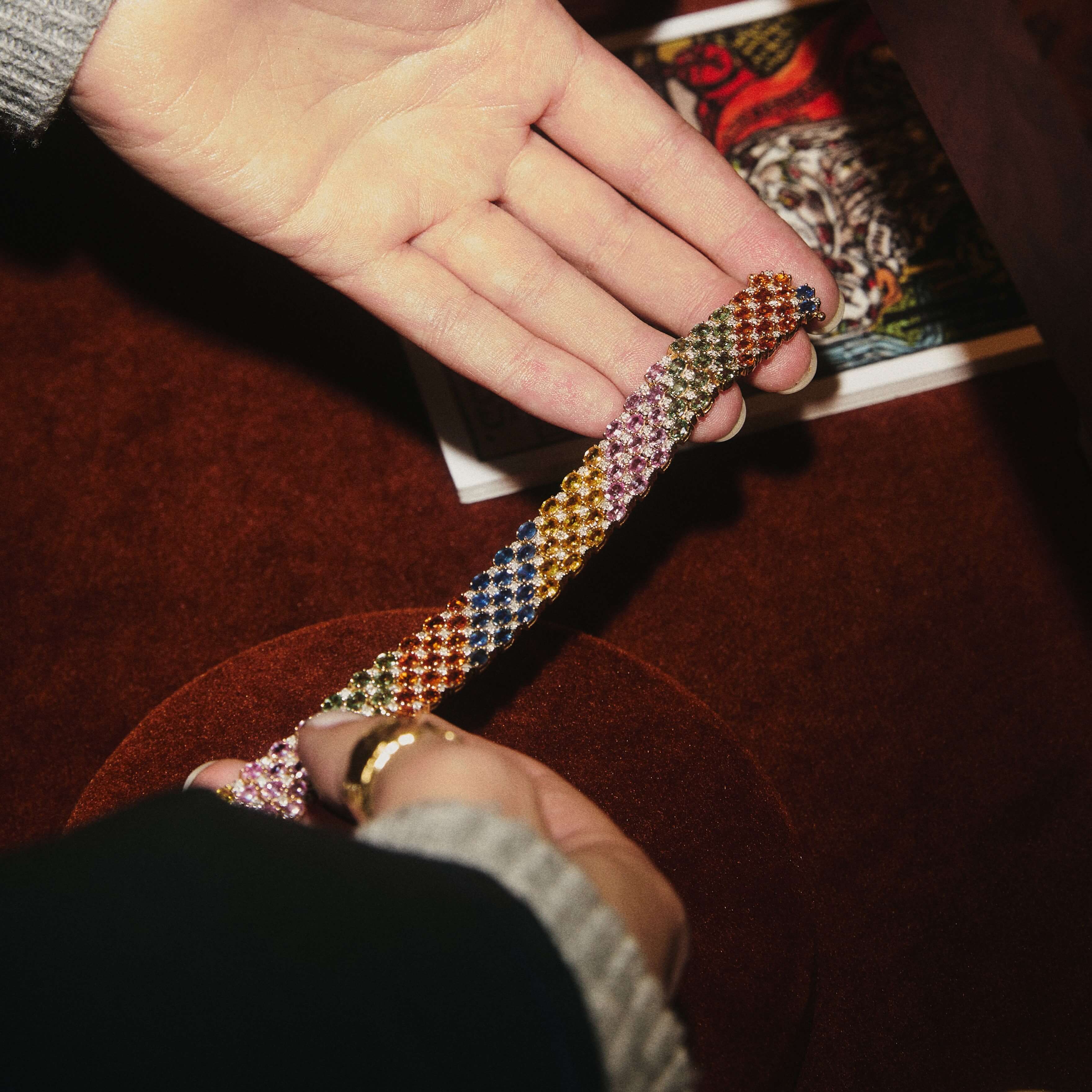 Gold bracelet with colorful sapphires and diamonds