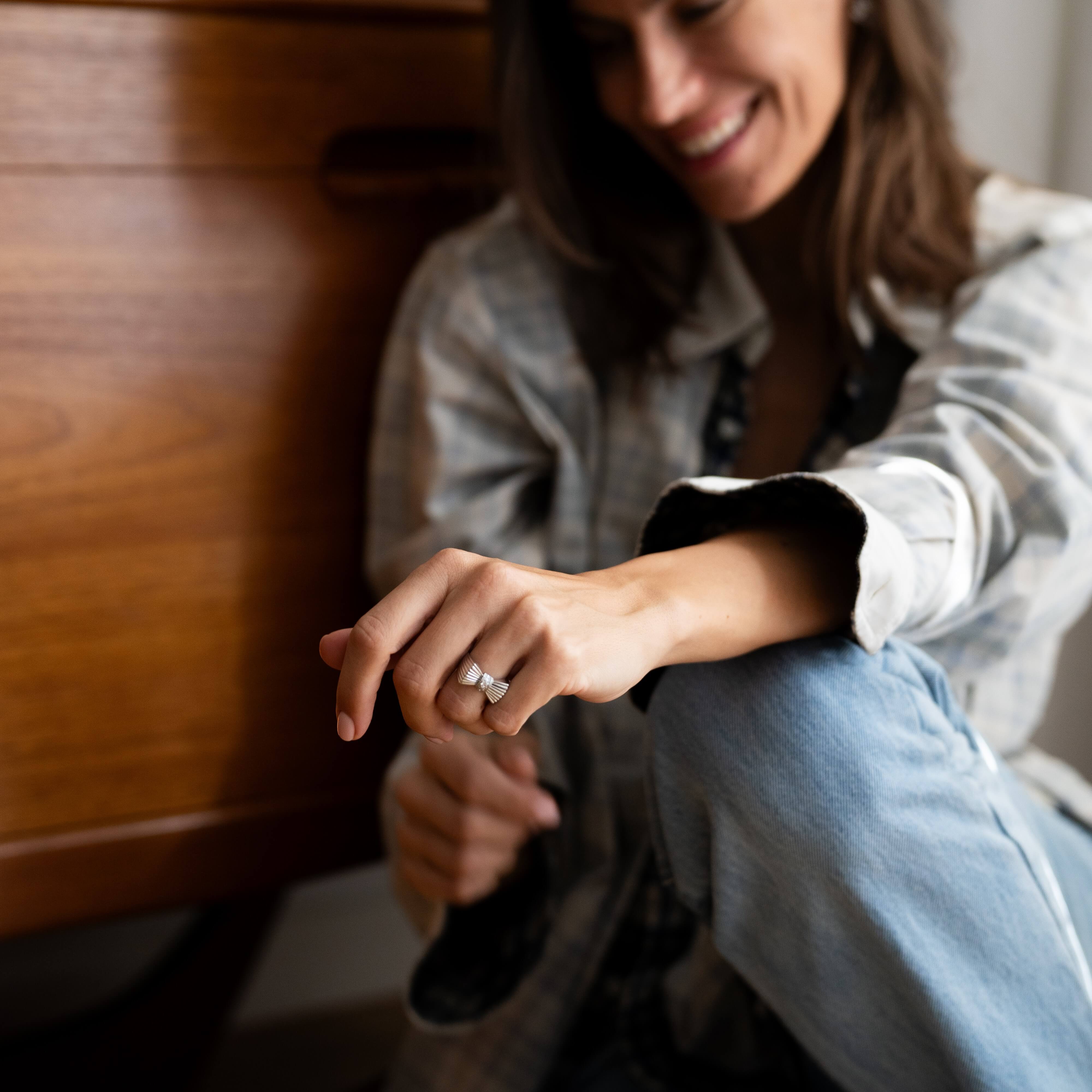 Mid-20th century platinum bow diamond ring