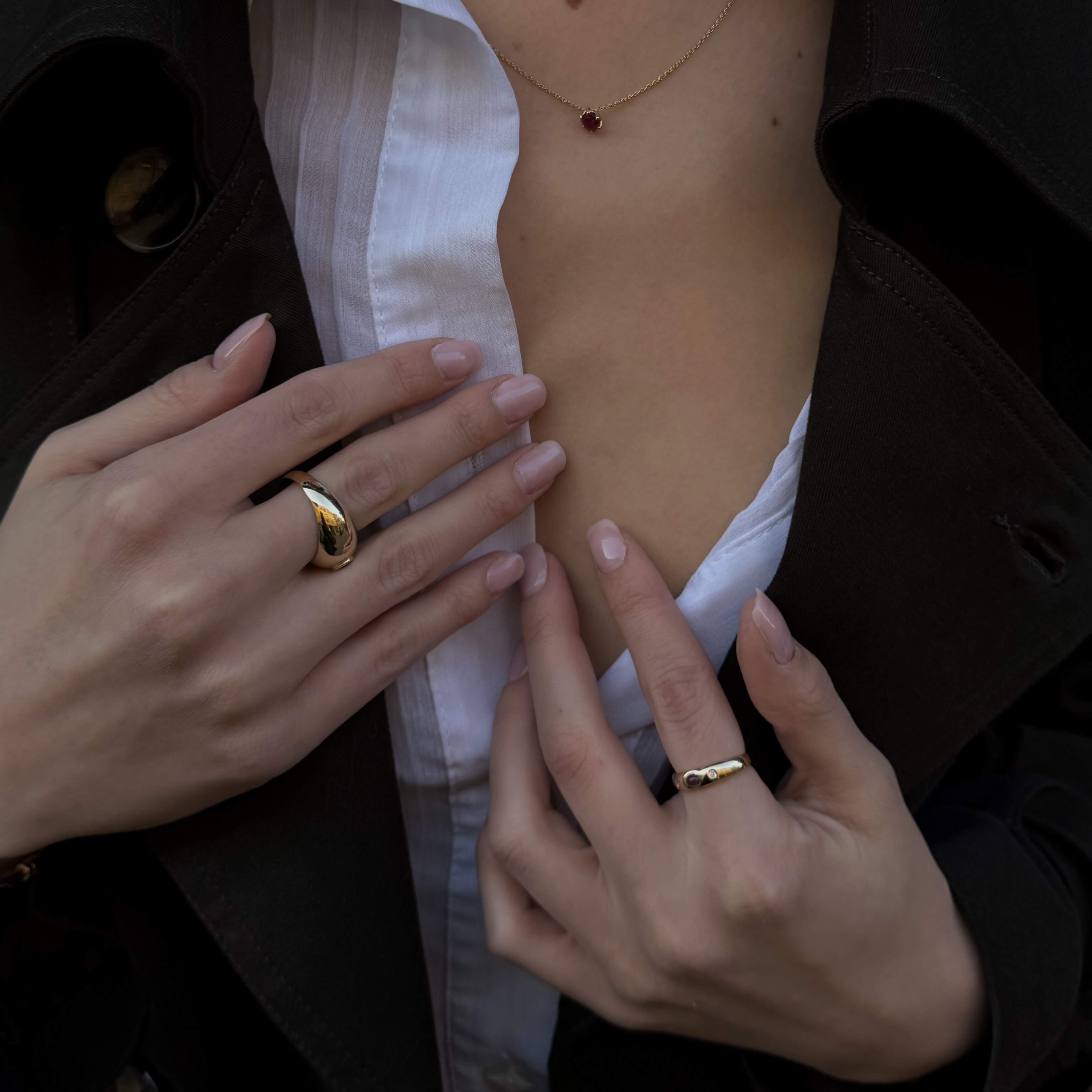 Gold signet ring with diamonds and a ruby