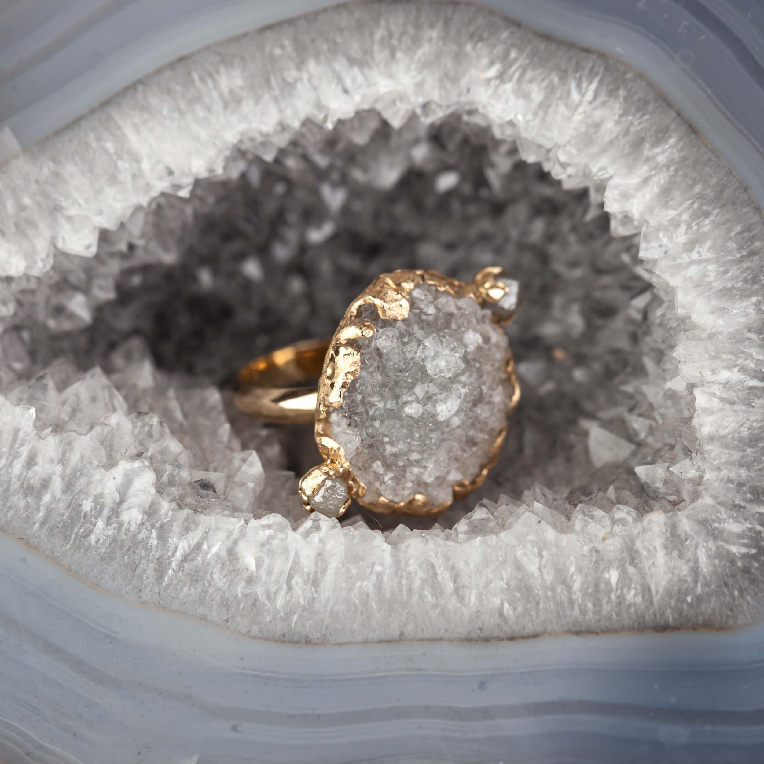 Gold ring with raw quartz and raw diamonds