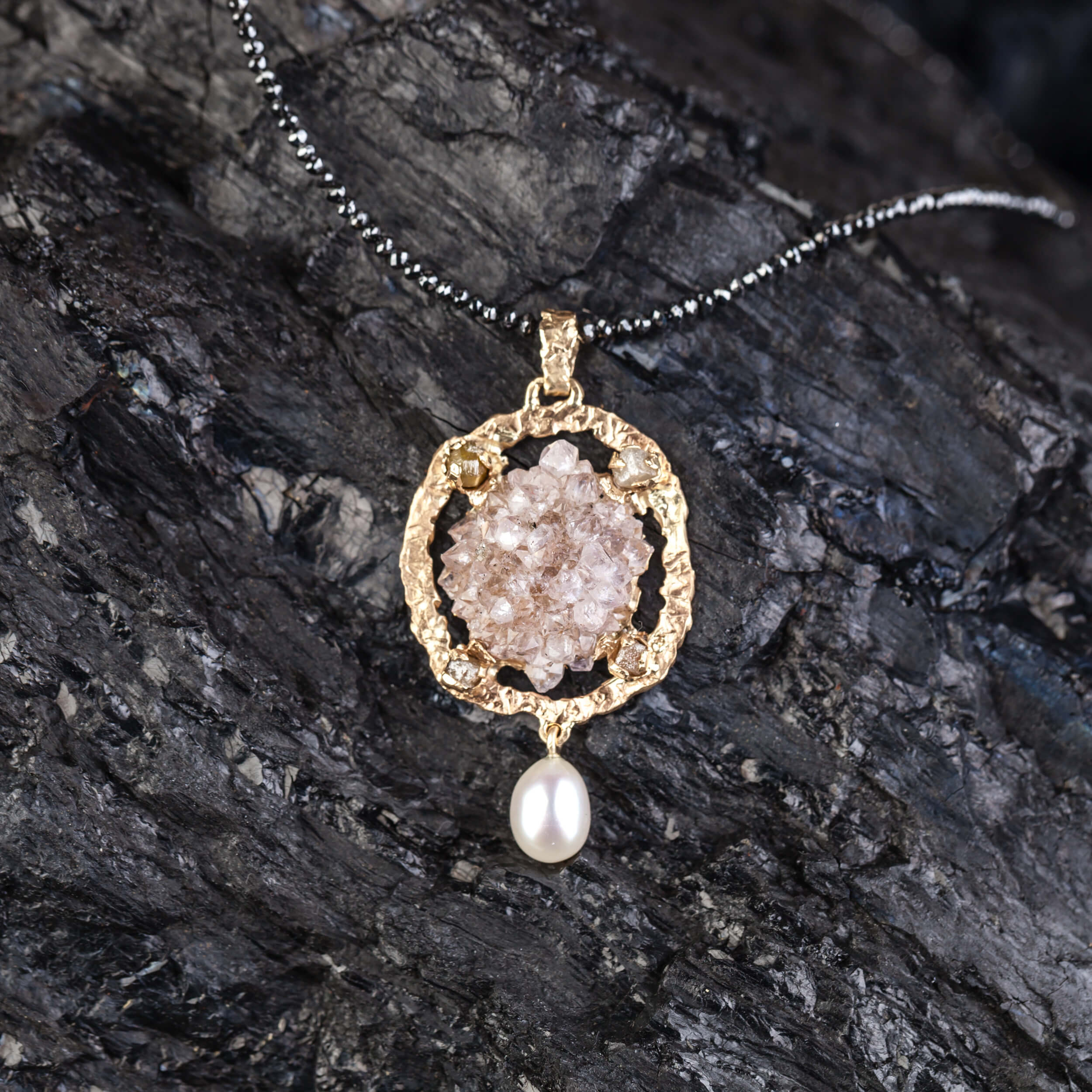 Gold pendant with raw quartz, raw diamonds and a white pearl