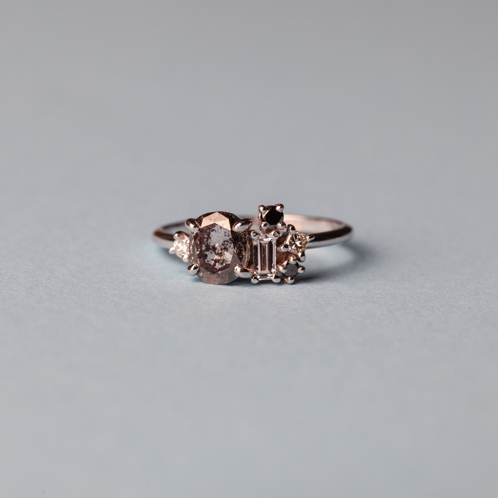 Gold ring with Salt and Pepper diamond