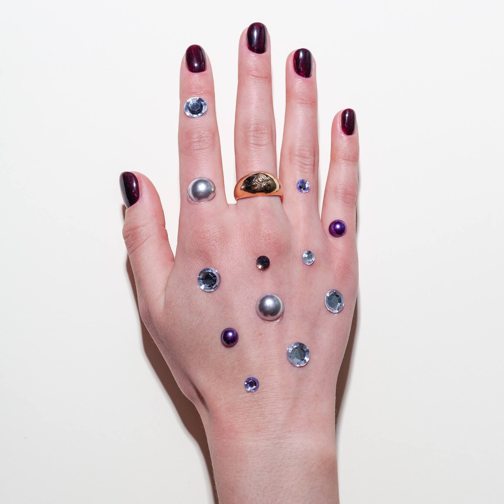 Bubble Ring gold signet ring with a brown diamond