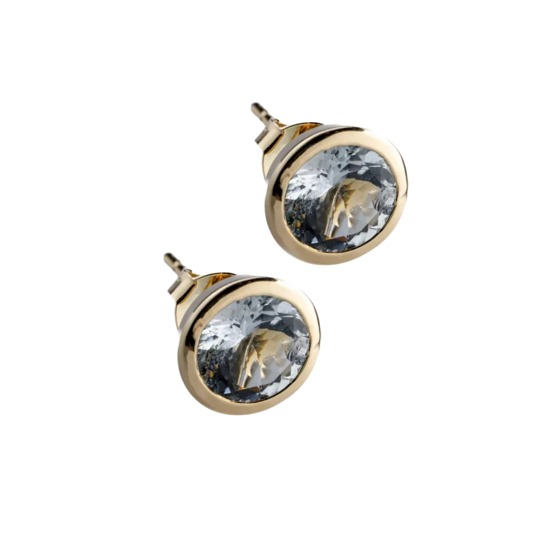 Gold stud earrings with 3 ct aquamarines in a bezel setting