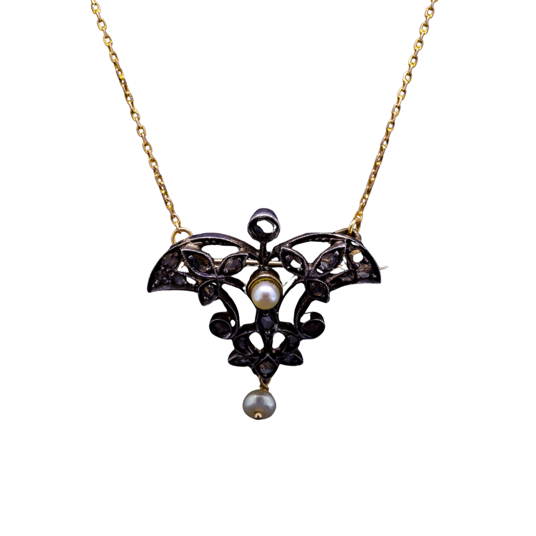 Gold brooch-necklace with diamond rosettes and pearls, late 19th/early 20th century