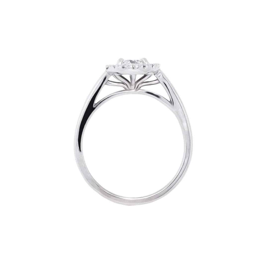 Diamond halo engagement ring in yellow gold