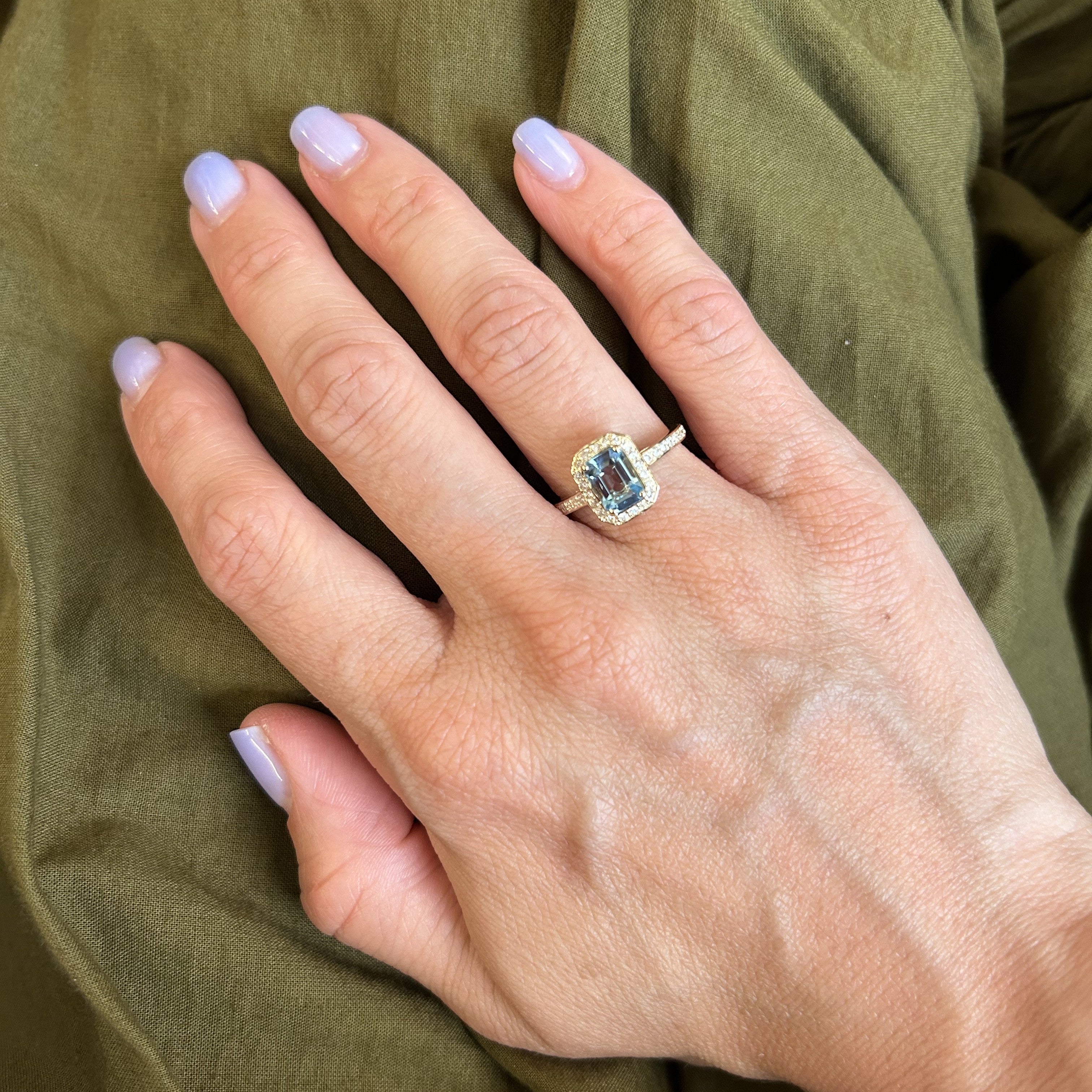 Gold ring with diamonds and aquamarine