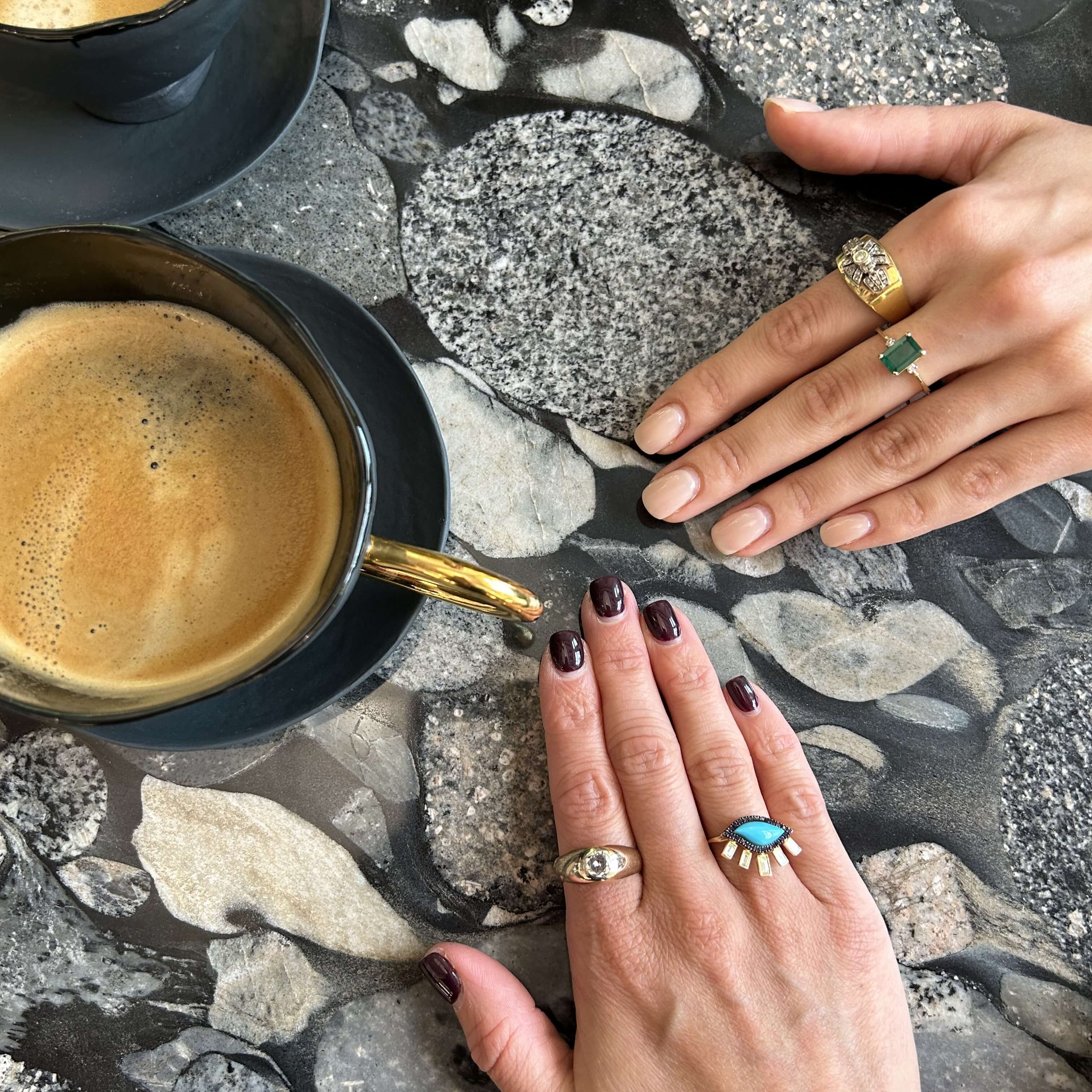 Gold ring with emerald and diamonds