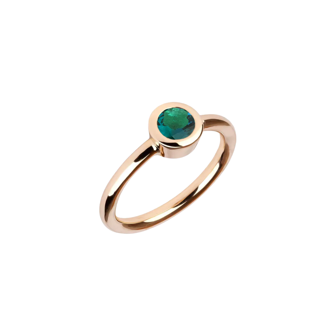 Gold ring with indigo tourmaline in a bezel setting
