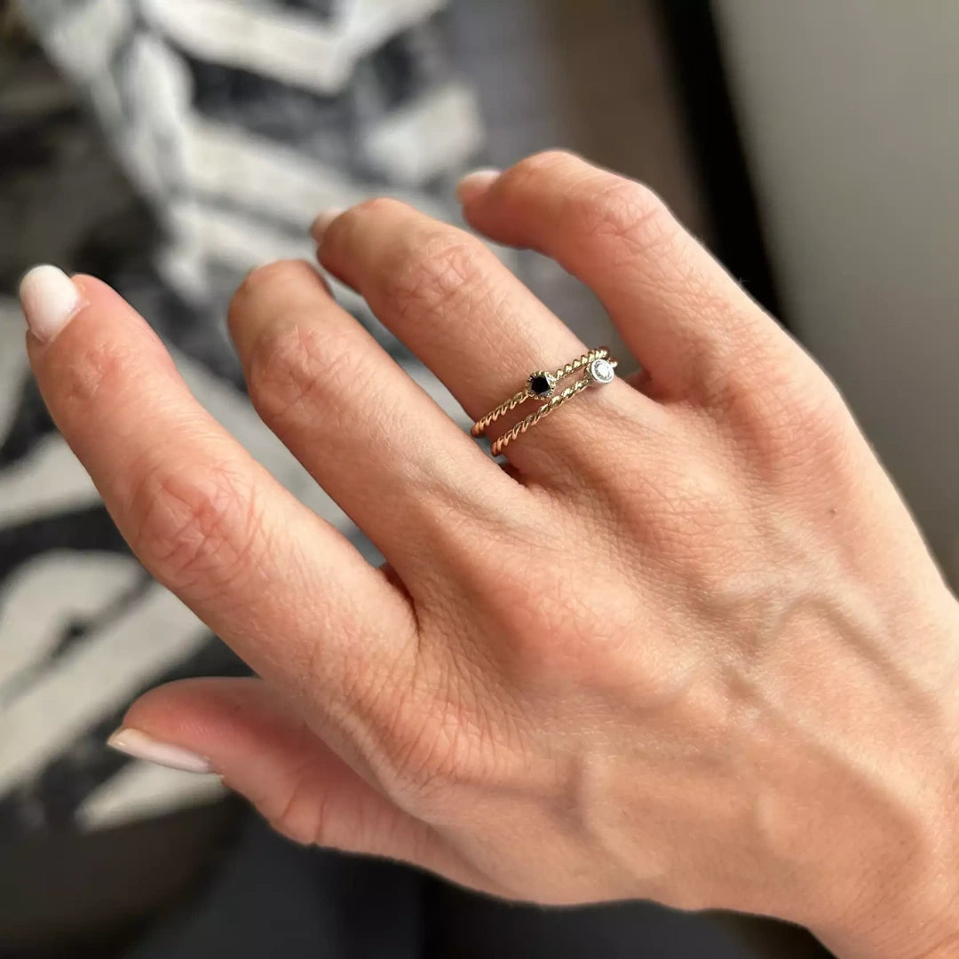 Gold spiral ring with colorful gemstone