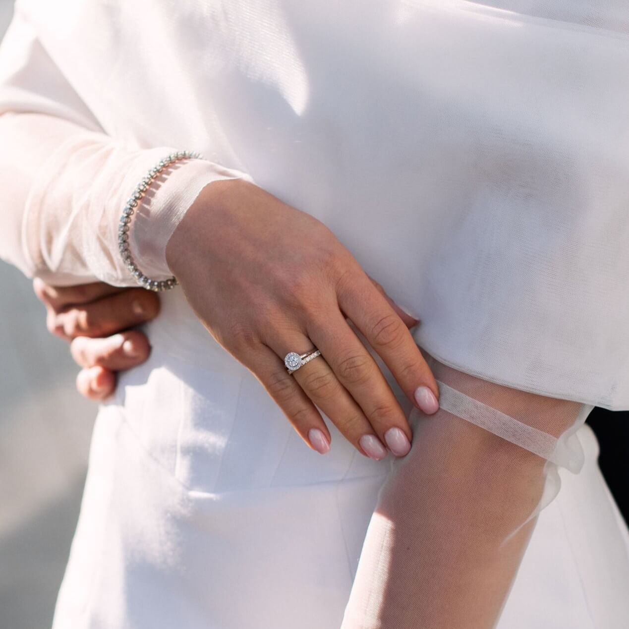 Diamond halo engagement ring in yellow gold
