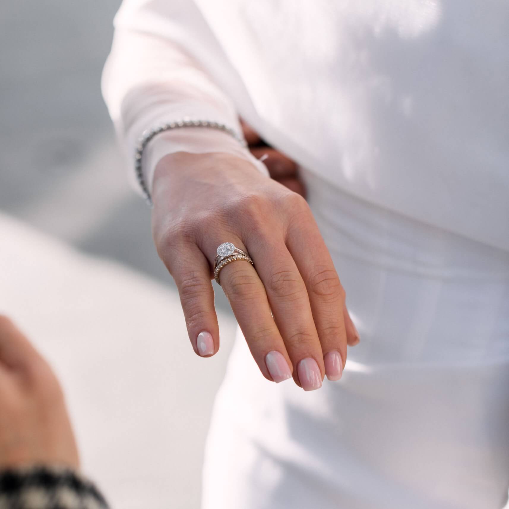 Diamond halo engagement ring in yellow gold