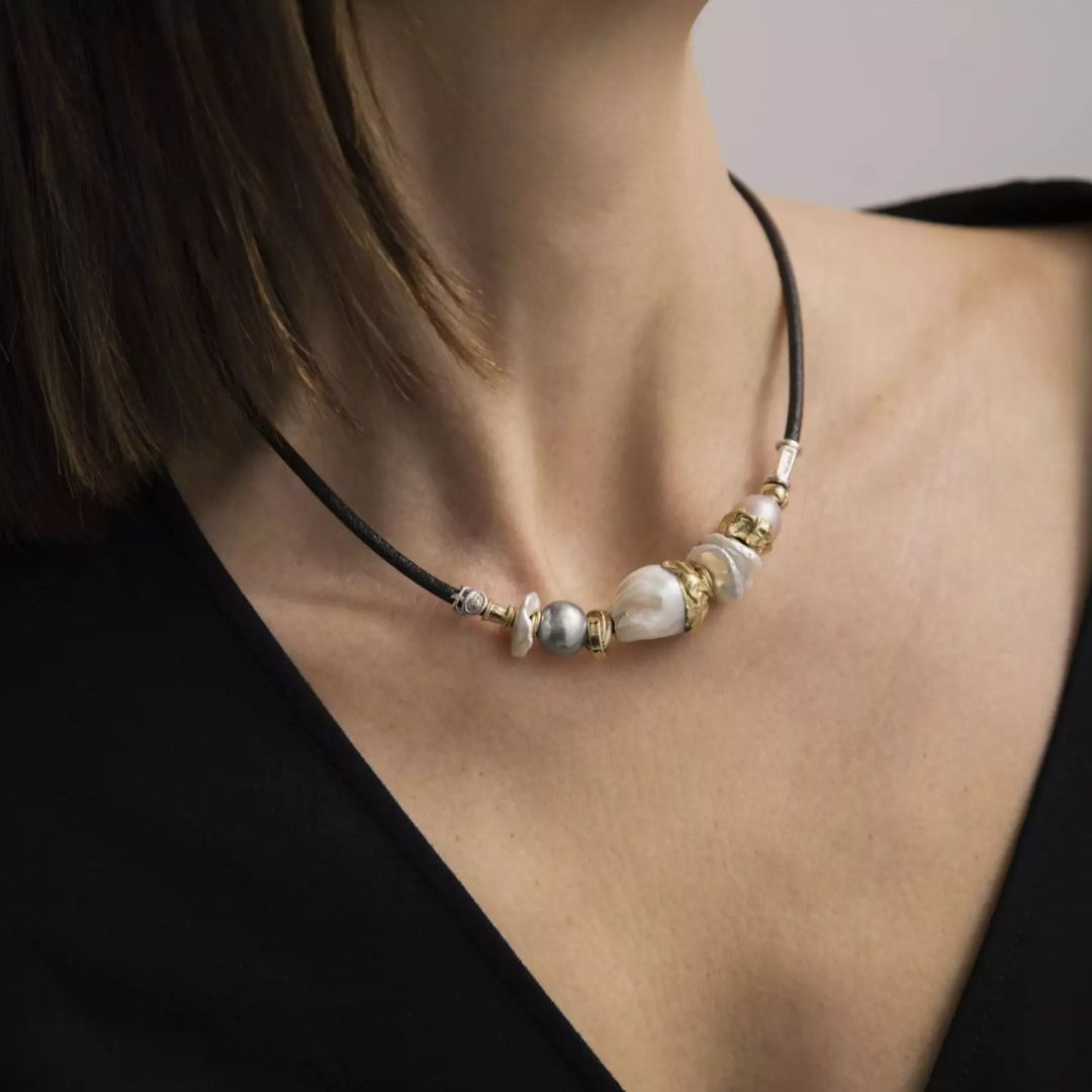 Leather necklace with baroque pearls and gold and silver elements