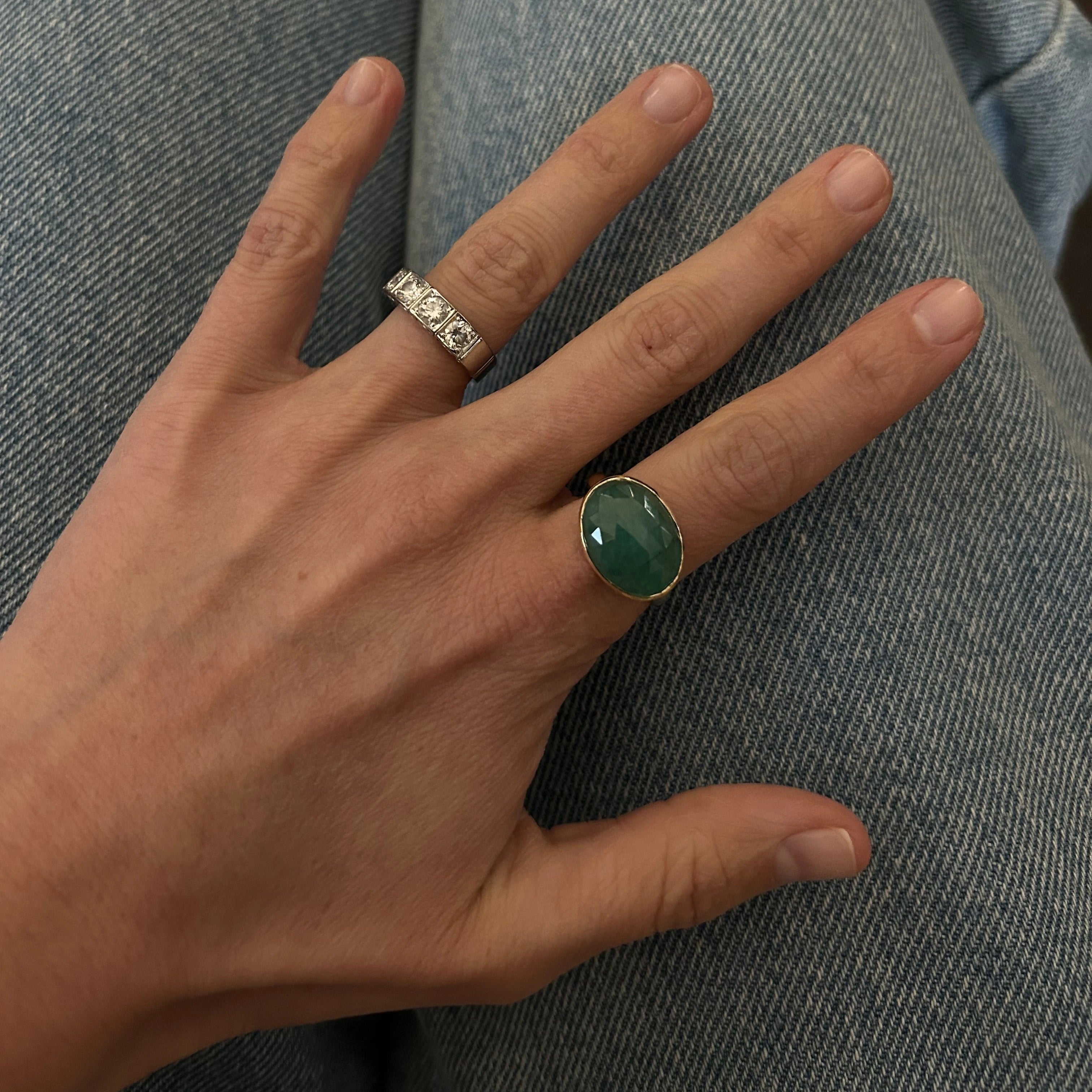 Gold ring with faceted emerald