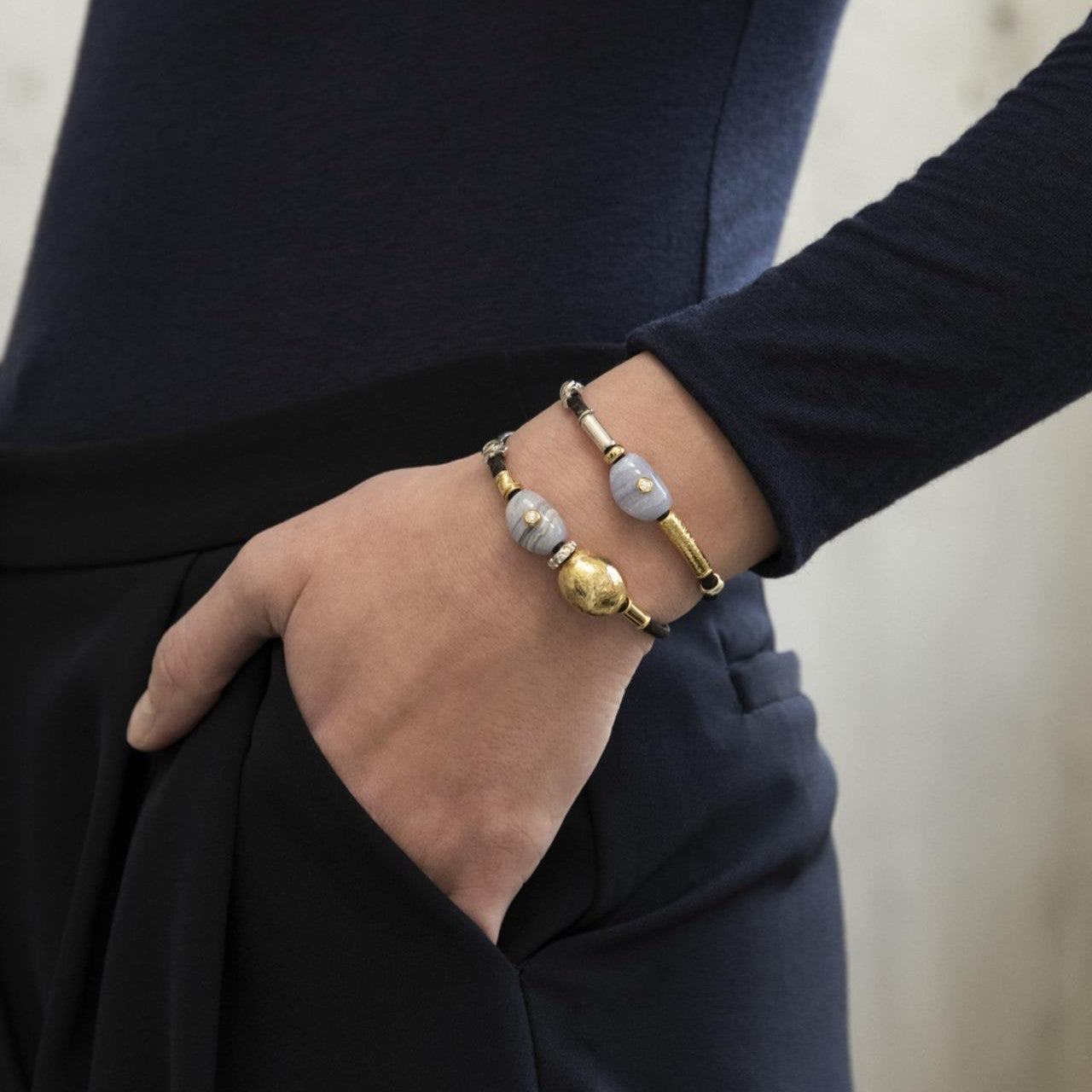 Leather bracelet with diamonds, agate, gold, and silver elements