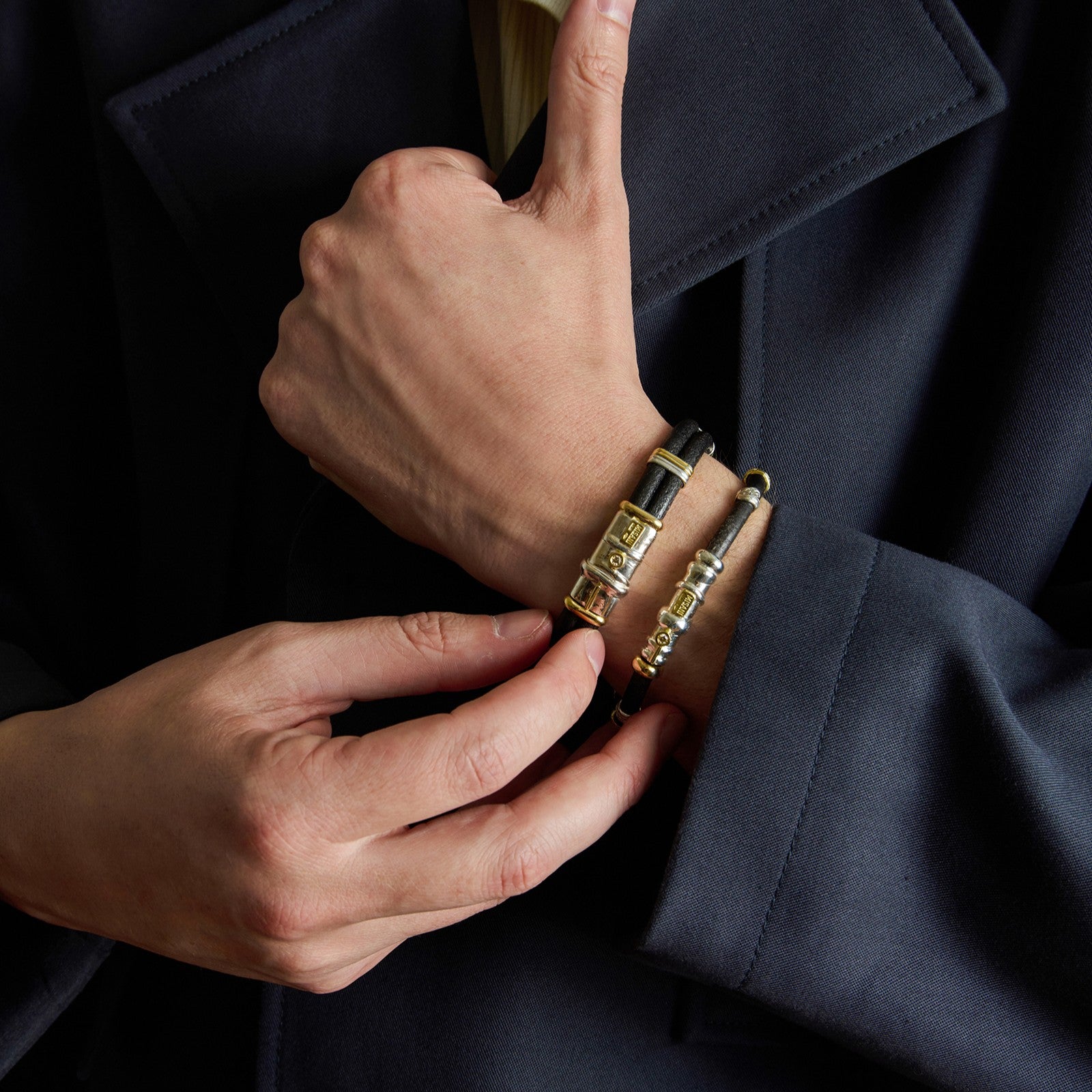 Leather bracelet with a diamond and silver and gold elements