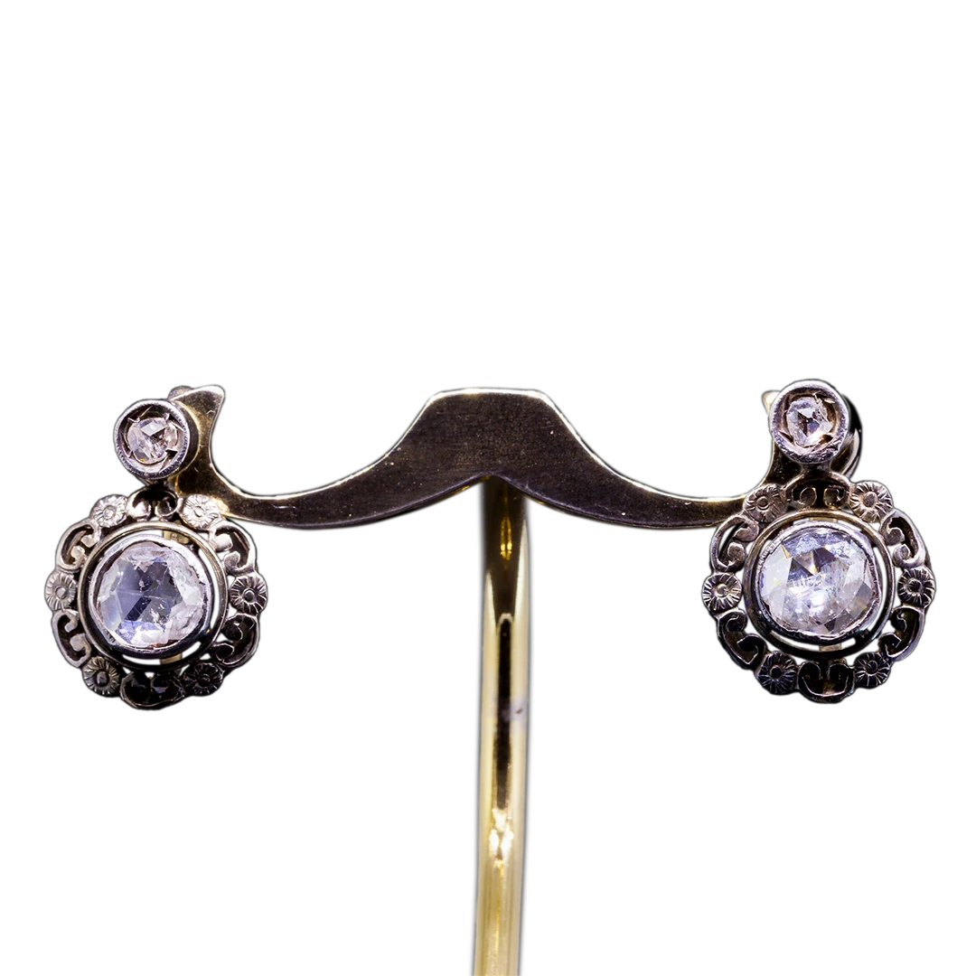 Gold and silver earrings with diamond rosettes, late 19th/early 20th century.