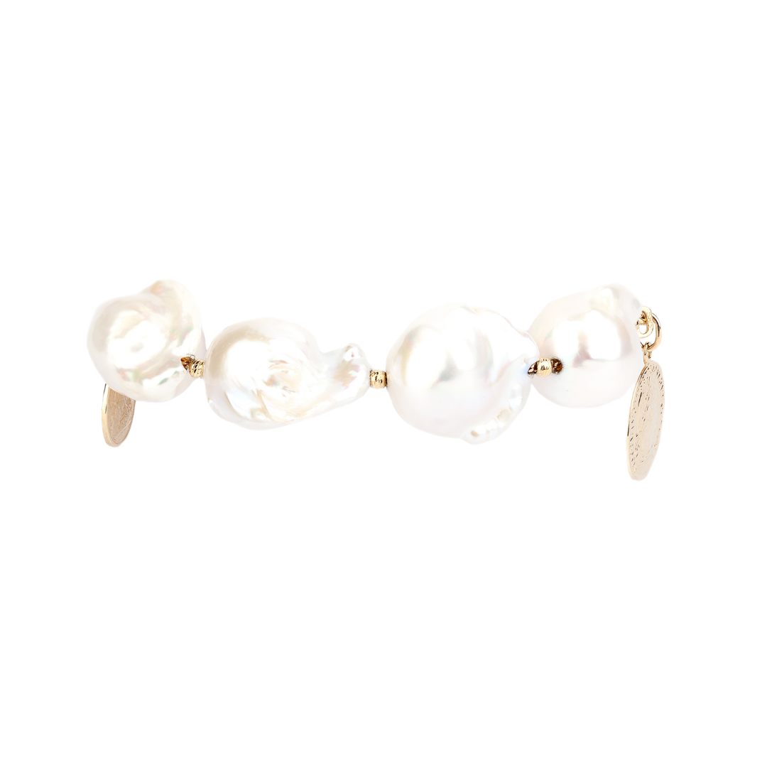 Gold bracelet with Baroque comet pearls Seafood