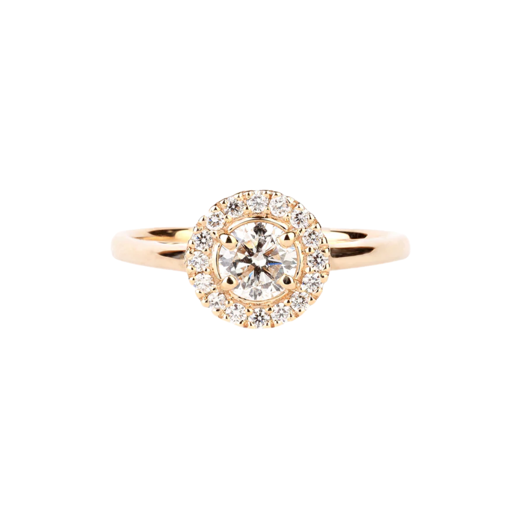 Diamond halo engagement ring in yellow gold