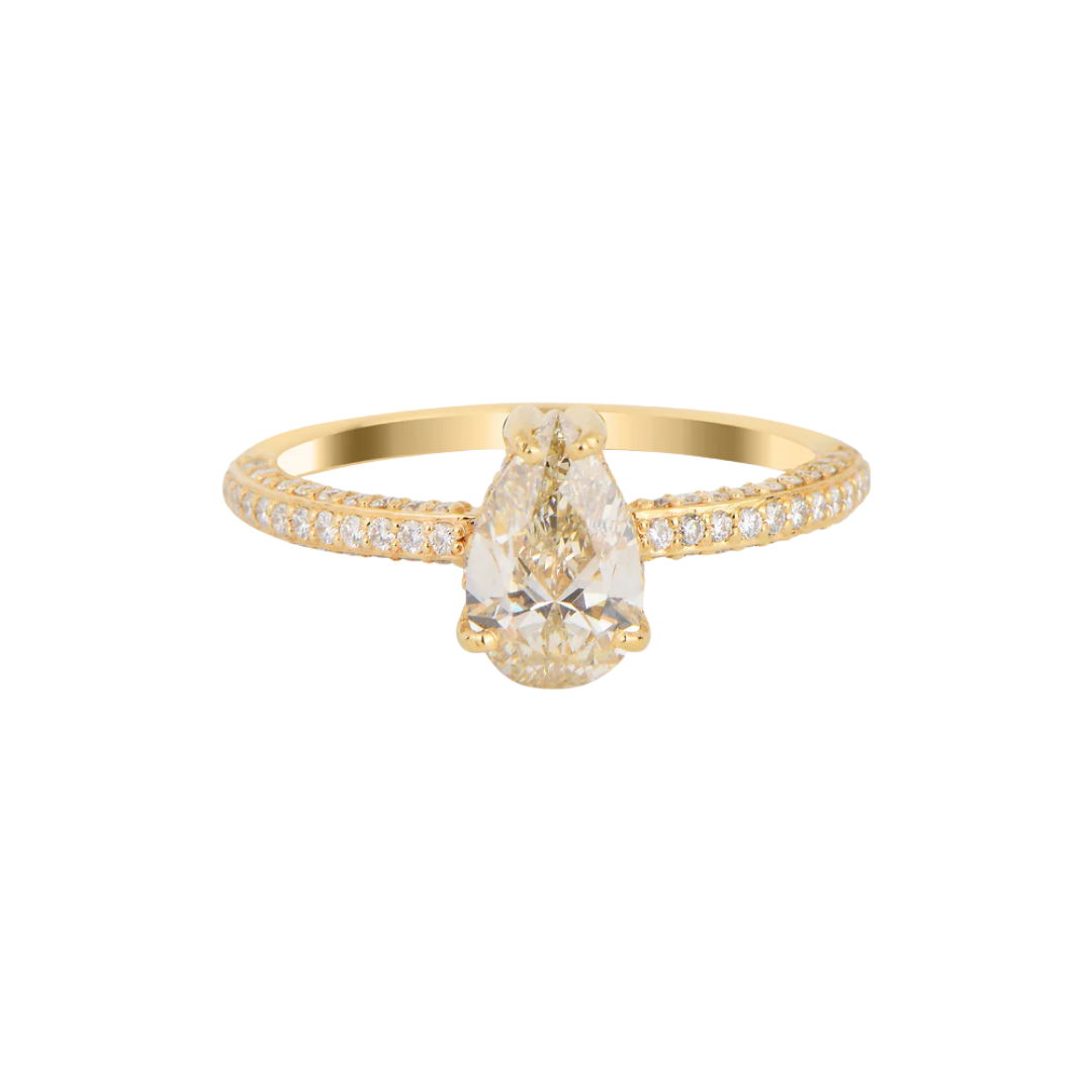 Gold ring with 1 ct champagne diamond in pear cut