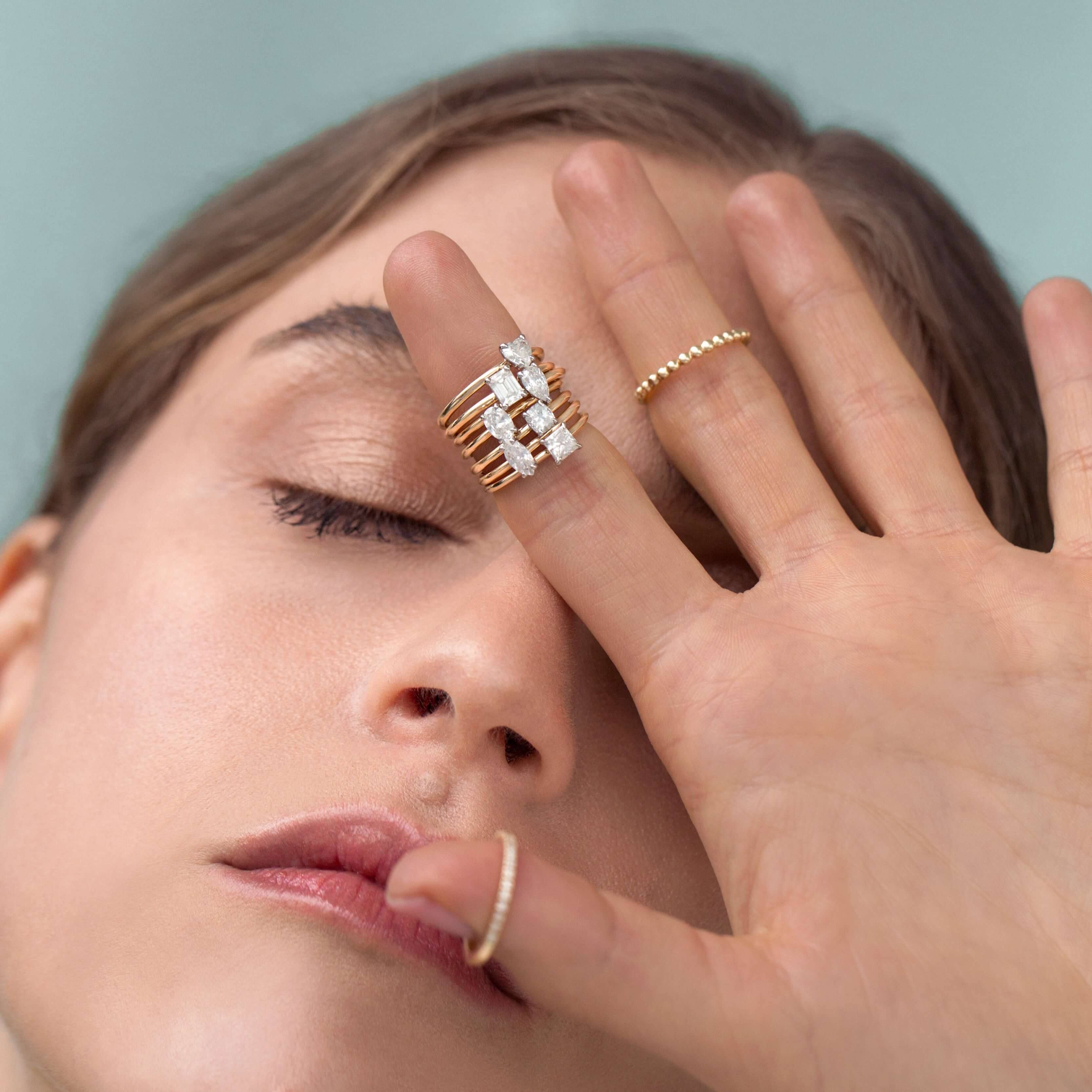 Simple Fantasy gold ring with a marquise-cut diamond