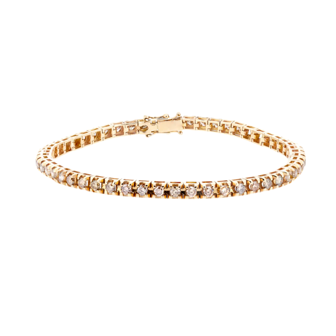 Złota bransoleta tenisowa z diamentami