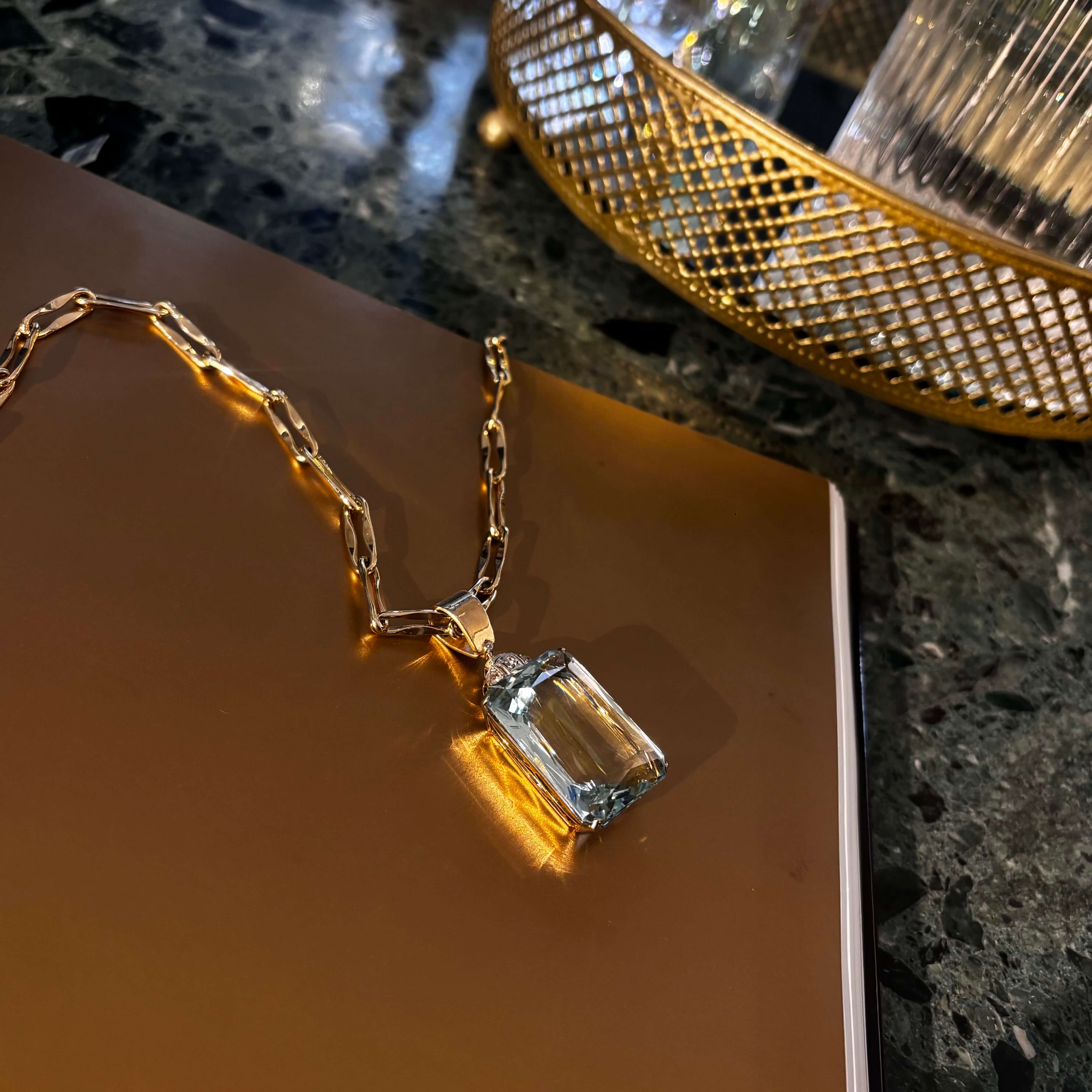 Art Deco gold pendant with 44 ct aquamarine and diamonds